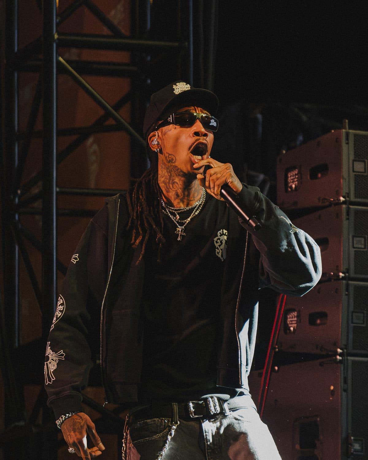 Rapper performing under stage lights
