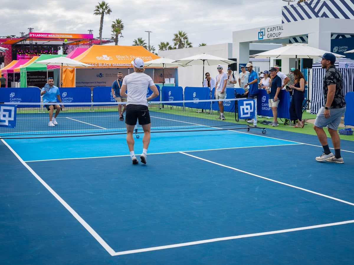 Pickleball match at a festival court