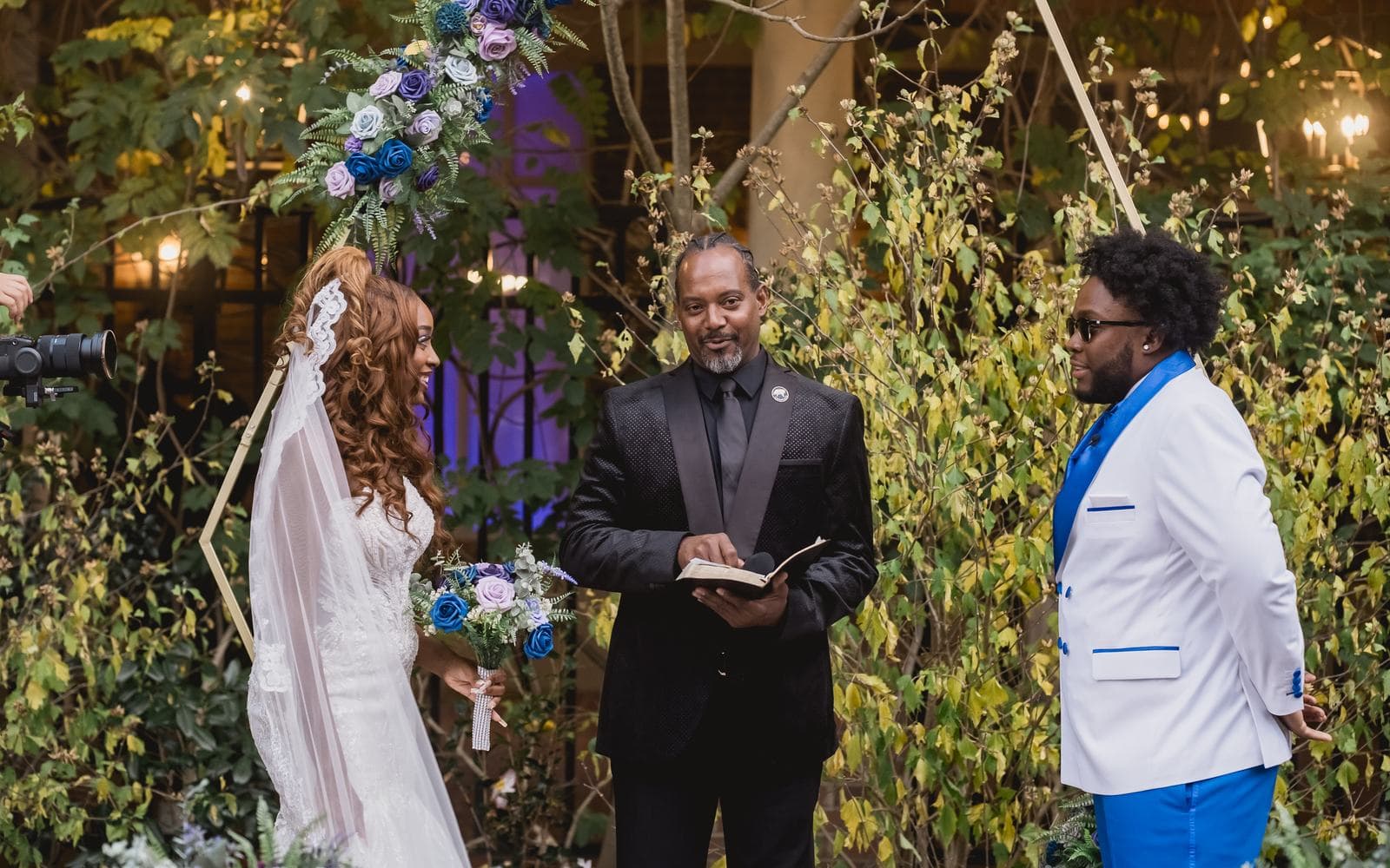 Wide view of an intimate garden wedding ceremony