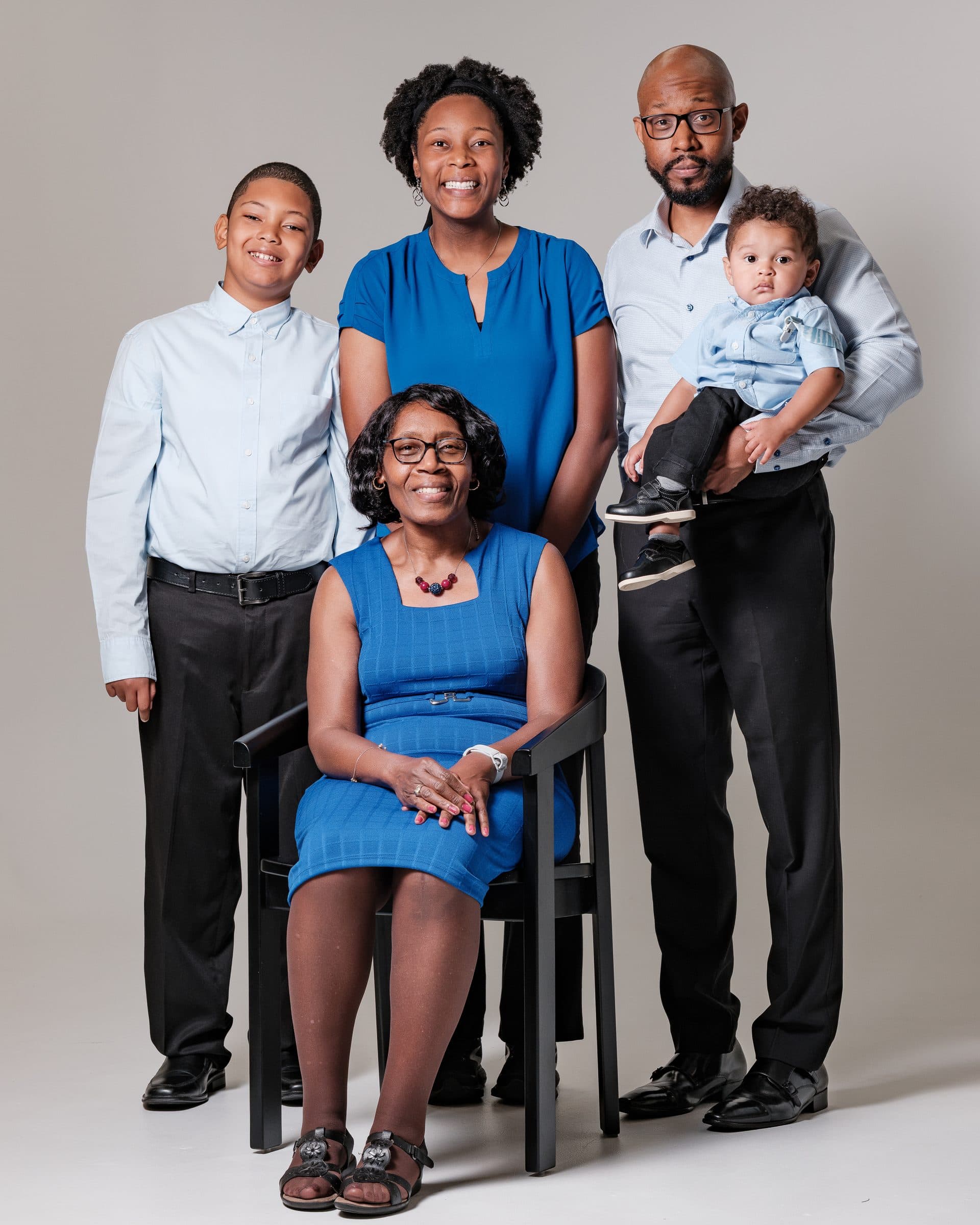 Multigenerational family portrait in a studio